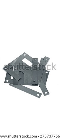 Ferrite core for transformers on a white background.