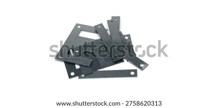 Ferrite core for transformers on a white background.