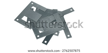 Ferrite core for transformers on a white background.