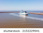 Ferry boat arriving in the harbor from Harlingen in Friesland the Netherlands