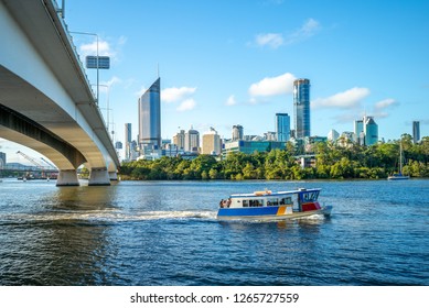 Ferry Cruise On Brisbane River With City Skyline Background