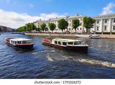 ferry excursion navigation along rivers and channels with views of architectural monuments in the city on the Neva - Saint Petersburg
