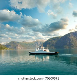 Ferry In The Fjord