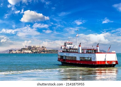 Ferry ship against Alcatraz prison Island in San Francisco, California, USA