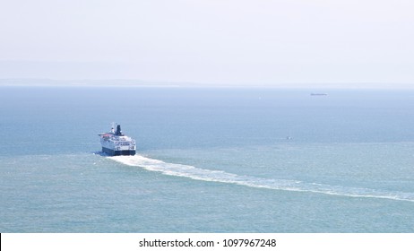 Ferry Ship Sailing Away On The Ocean