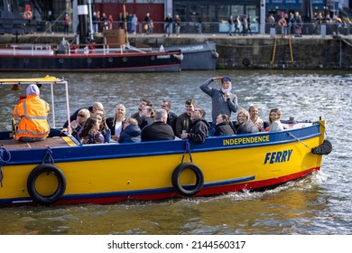 Ferry tour in Bristol harbour with "Uncle Albert" standing and saluting in Bristol Harbour, Bristol, UK on 9 April 2022