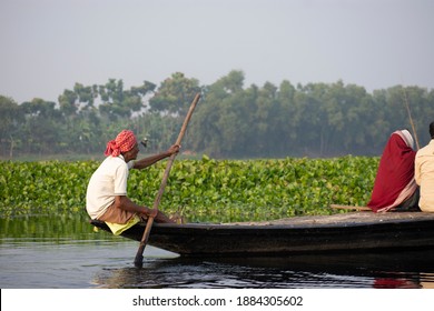 A Ferryman Of Majhi In Bengali Of West Bengal In Action