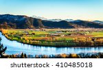 The fertile farmland of the Fraser Valley in British Columbia south of the Fraser River with Mount Baker in the distant background behind Sumas Mountain from Mission Hill, north of the Fraser River