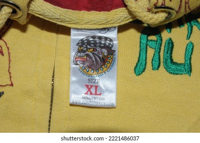 Fes, Morocco - September 6, 2022: Vintage Christian Audigier Ed Hardy  Tag Photographed On A White Background