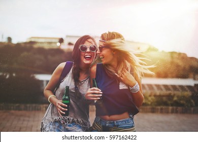 Festival Party Girls In Summer Having Fun And Drinking