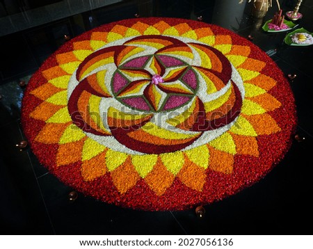 Festivals of Kerala, India. Floral carpet made of petals of various flowers during Onam.                                   