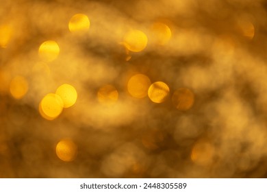 festive abstract bokeh background in golden tones - Powered by Shutterstock