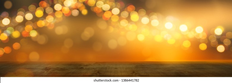 festive background with empty wooden table in foreground, shiny lights like party tent, holiday concept with advertising space - Powered by Shutterstock