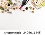 Festive background for the Jewish holiday Passover. Traditional treats, bottle of wine, matza on white background. Top view. A copy space. border