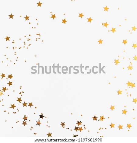 Festive  background. Shining stars on white background. Christmas. Wedding. Birthday. Happy woman's day. Mothers Day. Valentine's Day. Flat lay, top view, copy space.