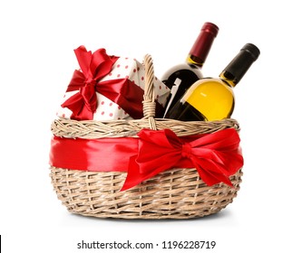 Festive Basket With Bottles Of Wine And Gift On White Background