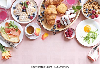 Festive Brunch Or Breakfast Set For Valentines Day, Mothers Day Or Easter. Pink Background. Overhead View .