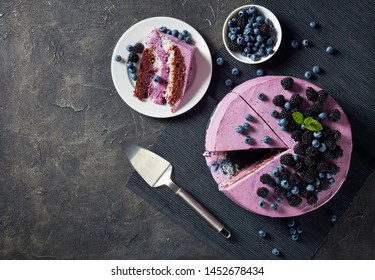 Festive Cake, Blueberry And Blackberry Sponge Cake With Cream Cheese Inside On A Plate On A Concrete Table, Horizontal View From Above, Copy Space