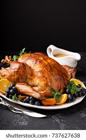 Festive Celebration Roasted Turkey With Gravy For Thanksgiving Or Christmas