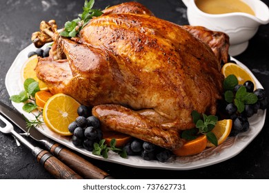 Festive Celebration Roasted Turkey With Gravy For Thanksgiving Or Christmas