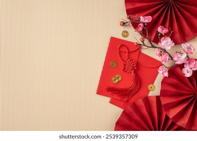 Festive Chinese new year setting with traditional red envelopes, cherry blossoms, and gold coins on a patterned pastel background. Perfect for celebrating prosperity, luck, and new beginnings - Powered by Shutterstock