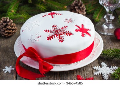 Festive Christmas Cake With White And Red Mastic ,selective Focus