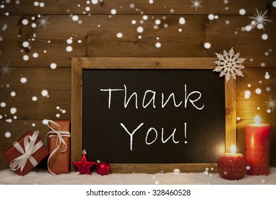 Festive Christmas Card With Chalkboard, Red Gifts Or Presents, Christmas Balls, Snowflakes And Candles. Christmas Decoration With Rustic, Vintage Brown Wooden Background. English Text Thank You - Powered by Shutterstock