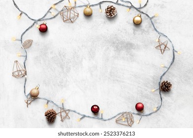 Festive Christmas fairy lights design, Flay lay Christmas decor element, Festive texture gray background with ornaments. Frame ornament gray texture background. - Powered by Shutterstock