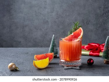 Festive citrus tequila smash cocktail with grapefruit. Christmas drinks.  - Powered by Shutterstock