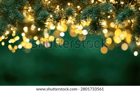 A festive close-up of a green pine tree branch adorned with warm, glowing golden Christmas lights, creating a bokeh effect against a blurred green background.