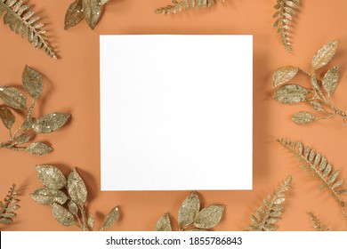 Festive Composition With Blank White Square Paper Card And Christmas Decorations. Top View, Mock Up, Flat Lay.