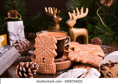  Festive decor, Speculaas koekjes and espresso for st. Nicolas . Dutch holiday Sinterklaas traditional sweets gingerbread cookies. 5th December holiday in the Netherlands. 