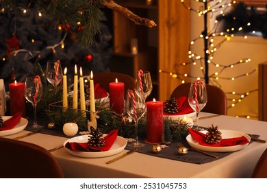 Festive dining table with Christmas setting in room - Powered by Shutterstock