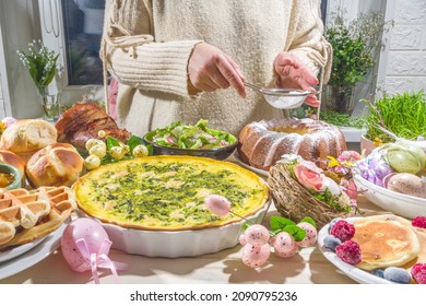 Festive Dinner, Easter Brunch. Traditional Easter Dishes On Family Home Table - Baked Meat, Quiche, Spring Salad, Muffin, Colored Eggs, Hot Cross Buns