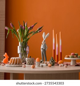 Festive Easter Table Setup with Tulips, Bunny and Pastel Accents