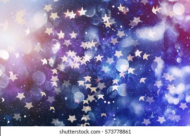 Festive elegant abstract background with bokeh lights and stars  .