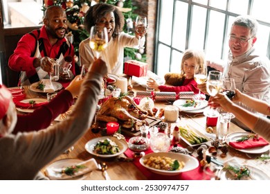 Festive family dinner with diverse group celebrating. Joyful gathering around table, sharing food and drinks. Holiday cheer with family and friends. Family and friends enjoying Christmas dinner. - Powered by Shutterstock