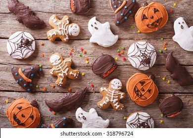 Festive Gingerbread Halloween On The Table. Horizontal View From Above
