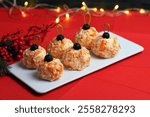 Festive Holiday Appetizer with Crab Sticks, Cheese, and Eggs Designed as Christmas Ornament Balls