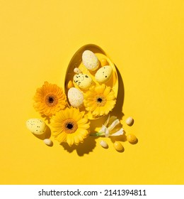 Festive holiday Easter composition. Yellow, pink and white easter eggs, daisy flowers on paper yellow background. Spring Easter card concept. Flat lay, top view, copy space. - Powered by Shutterstock