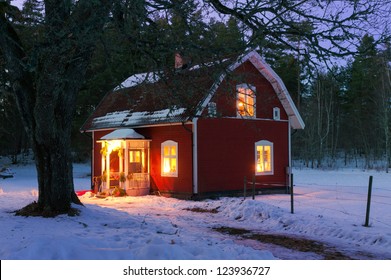 Festive Lighted House In Sweden At Christmas Time