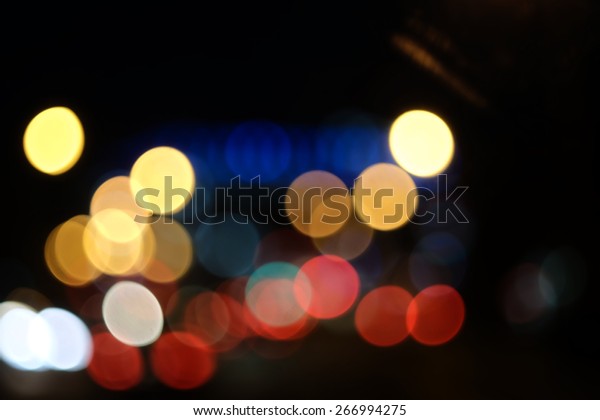 Festive Lights\
Bokeh Street Lights. Abstract background spherical bokeh of car\
lights in the night. A lot of space for text. Defocused abstract\
lights christmas background.\
