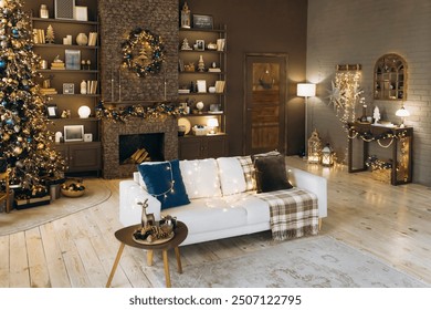 Festive living room with brown walls with a white sofa, blue and brown pillows, Christmas tree with ornaments and lights, stone fireplace with a wreath, and shelves with holiday decorations - Powered by Shutterstock