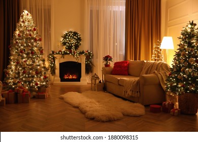 Festive Living Room Interior With Christmas Trees And Fireplace