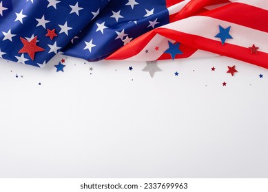 Festive mood of the public holiday: An evocative overhead composition displaying the American flag confetti stars on white backdrop. Ideal for advertisements or text placement during the occasion