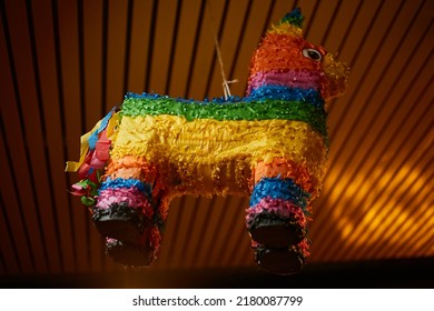 Festive multi-colored pinata in the form of a llama. Mexican hollow toy  - Powered by Shutterstock