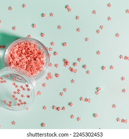 Festive Nail Designs  elements for nails decor  pink stars in glass box  stars for diy nail art in jar mint color background  copy space  Minimal style aesthetic template feminine blog social media