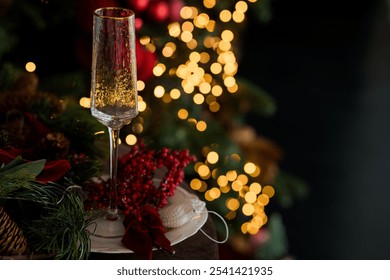 Festive New Year's Eve Setting with Champagne Flute and Christmas Decorations. - Powered by Shutterstock