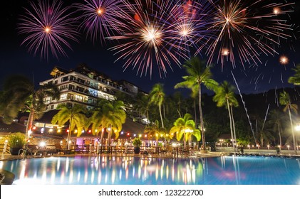 Festive New Year's fireworks over the Rayong bach, Thailand