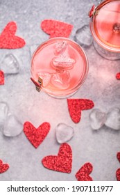 Festive Pink Cocktail With Champagne Or Prosecco  For St. Valentine's Day. Couple Of Glasses